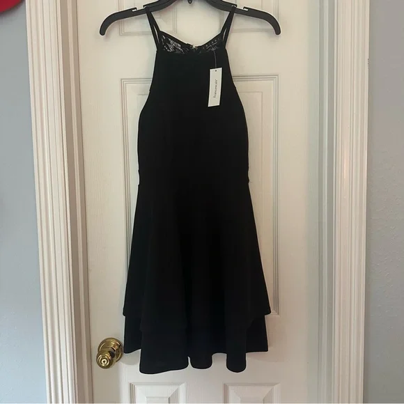 knee length dresses for ladies Black Fringe Cut Out Lace Up Back Long Sleeves Dress main image 0